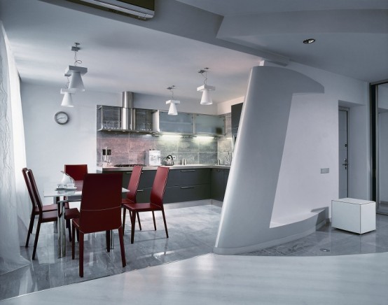 appartement moderne minimaliste cuisine ouverte table chaises rouge
