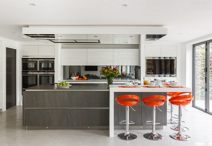 cuisine île orange moderne design espace de vie partagé design d'intérieur architecture contemporaine solide