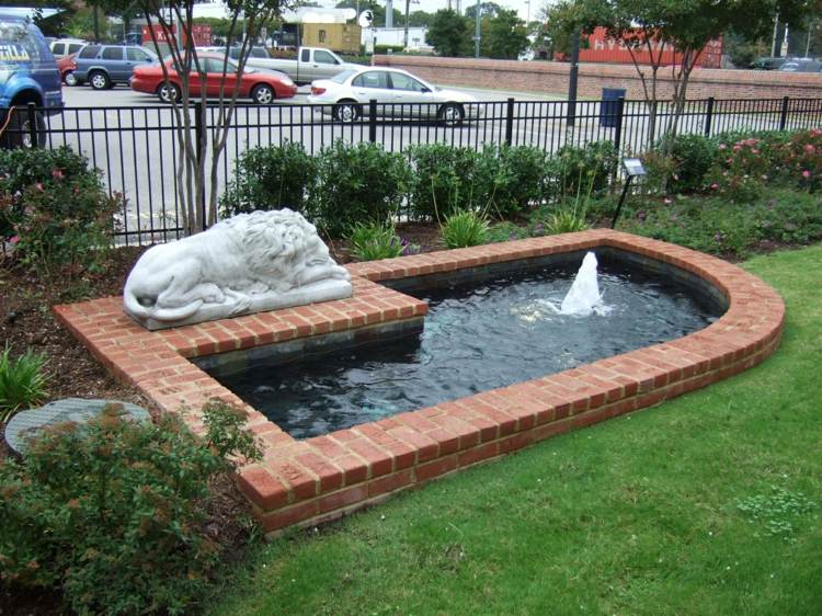 bassin jardin briques statue