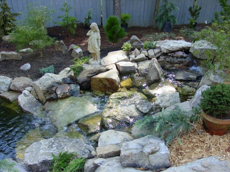 bassin jardin pierres statue
