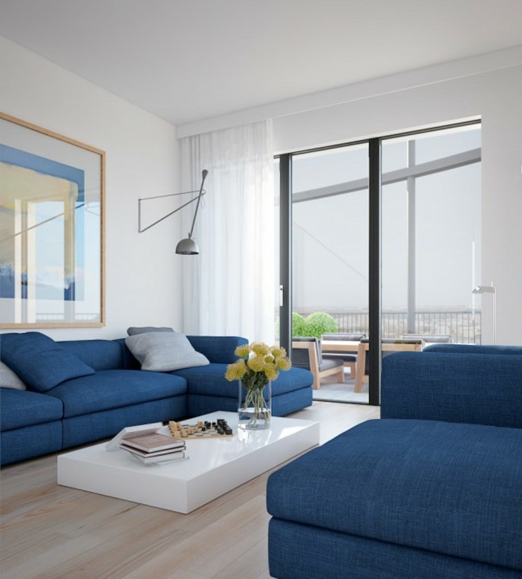 intérieur design salon moderne canapé bleu coussin luminaire déco murale 