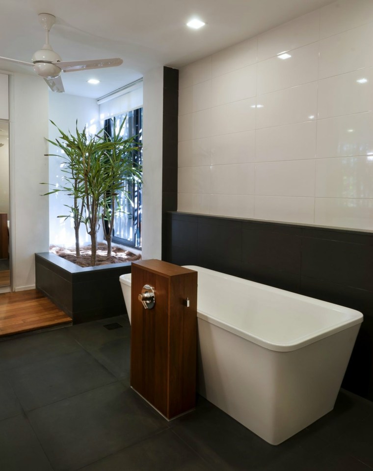 décoration salle de bain plante baignoire blanche design carrelage