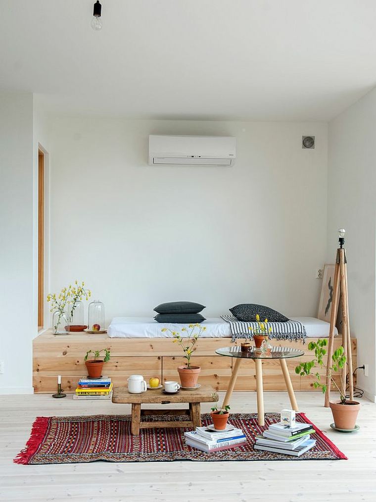 intérieur moderne design canapé lit tapis de sol motif chaise bois plante pot de fleurs
