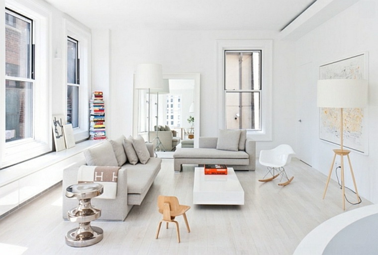 décoration salon appartement moderne canapé gris coussins table basse blanche déco cadre mural
