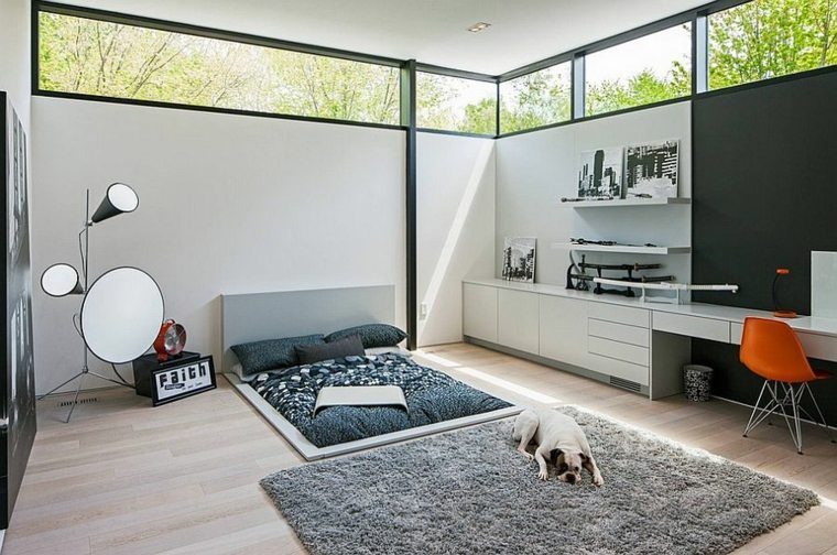 décoration appartement petit espace idée cadres tapis de sol gris lampe chaise orange meubles