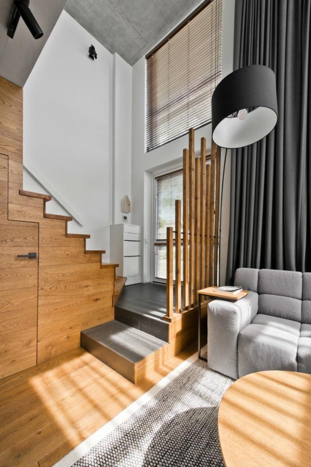 loft design contemporain escalier bois luminaire suspension tapis de sol gris