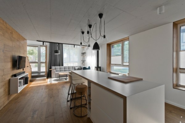 Cuisine îlot central loft contemporain design tabouret bois luminaire suspension industriel style