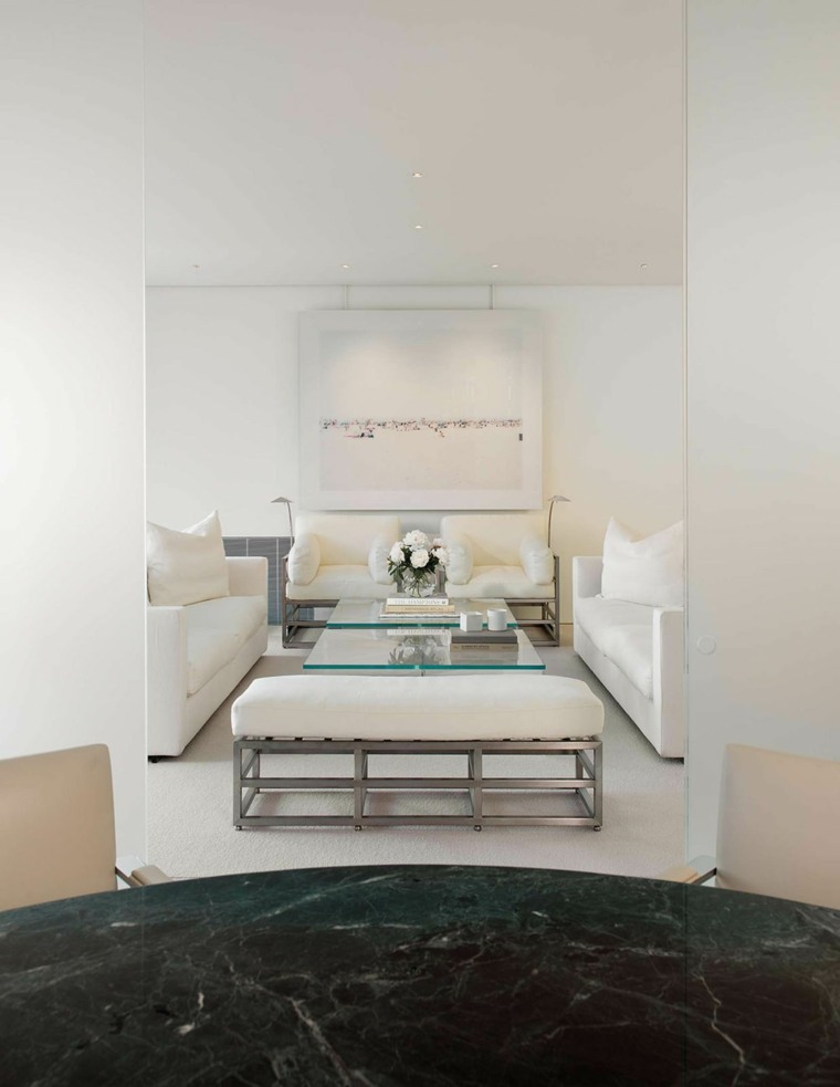 designer connu idée canapé blanc intérieur salon moderne tableau tapis table