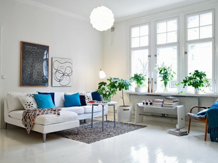 décoration naturelle idée salon canapé blanc déco mur luminaire suspension tapis de sol gris 
