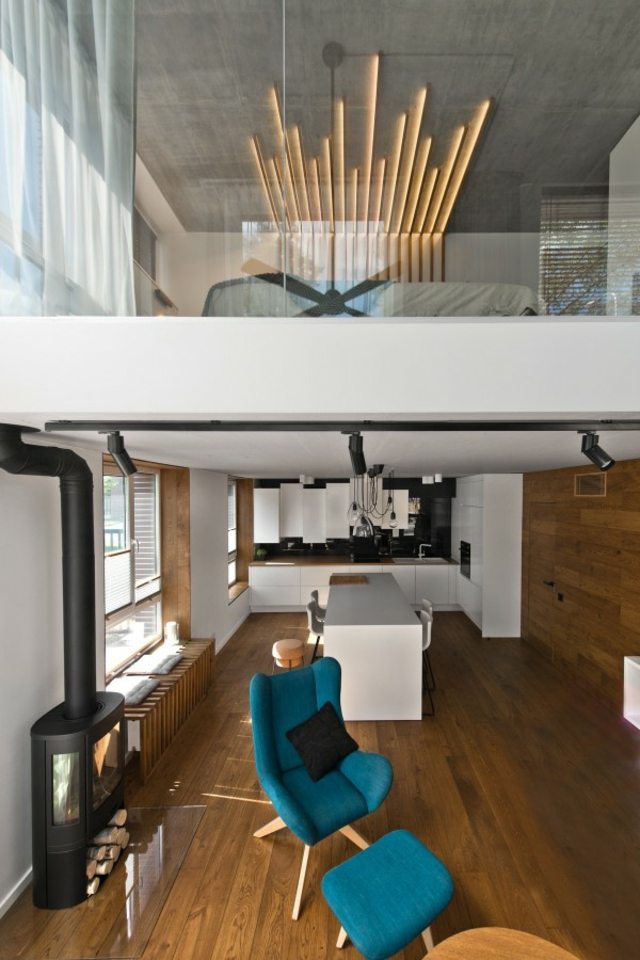 loft contemporain design idée luminaire appartement salon fauteuil bleu