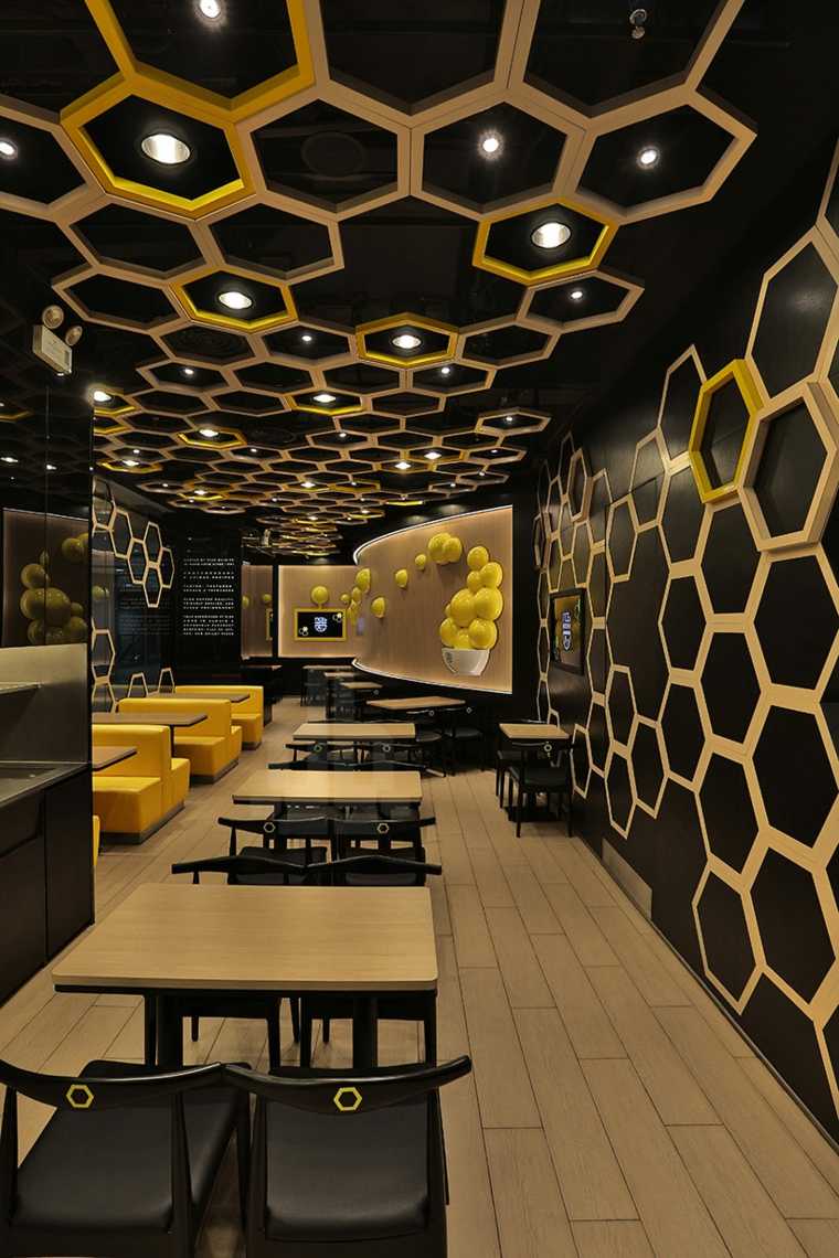 restaurant design moderne idée intérieur faux plafond design table bois