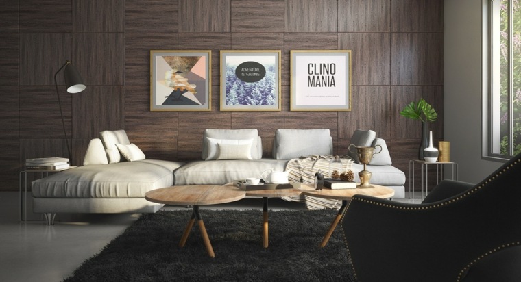 revêtement mural idée salon canapé blanc coussins mur en bois composition cadres tapis de sol gris foncé table basse bois