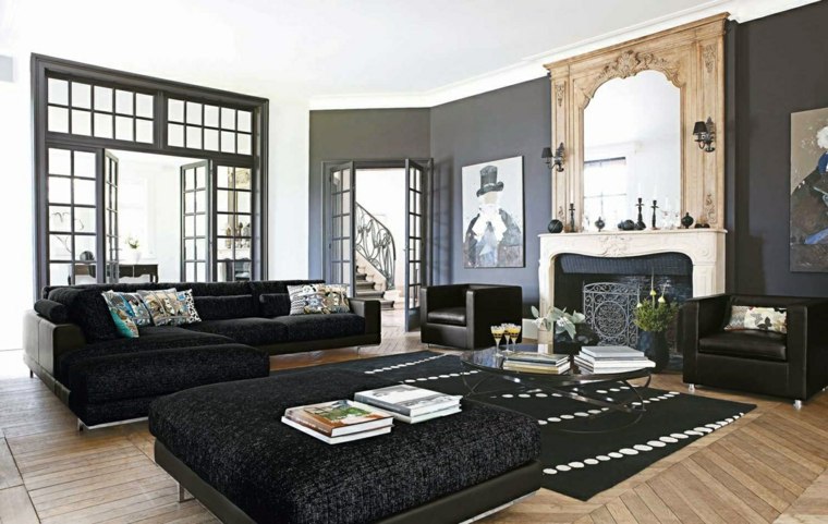 salon intérieur design moderne pouf noire canapé d'angle noir design coussins idée 