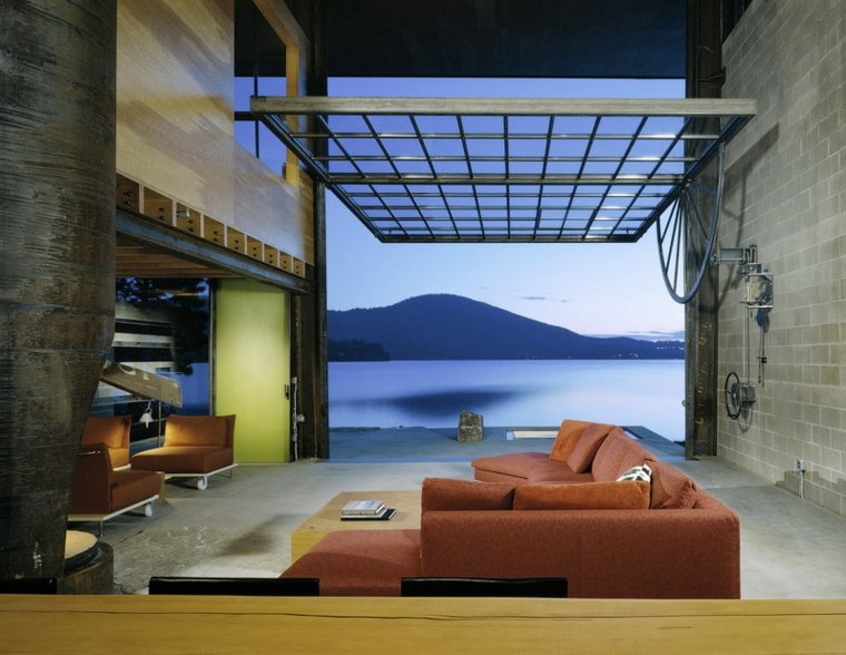 salon design moderne futuriste canapé d'angle fauteuil déco moderne table basse bois 