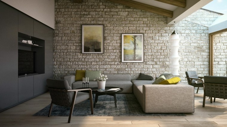 intérieur salon mur briques cadres déco tableau déco mur canapé d'angle gris table bois basse 