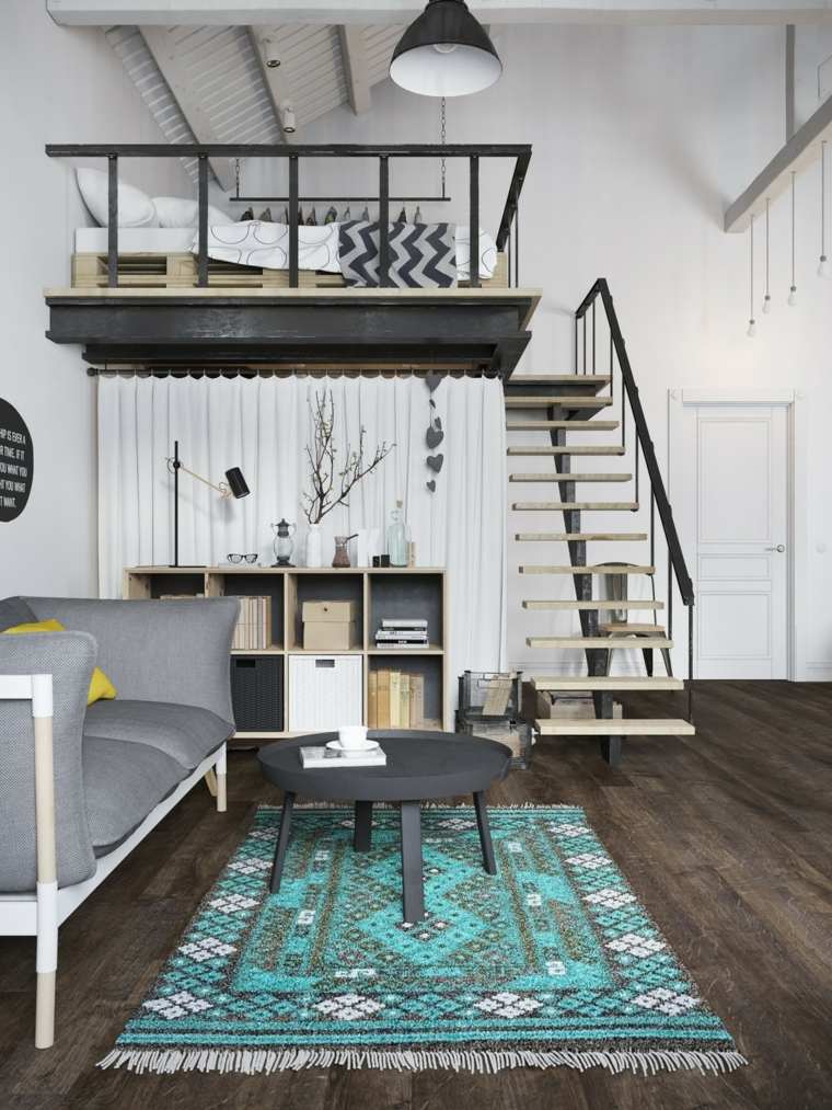 loft contemporain aménagement idée tapis de sol bleu escalier bois table basse noire canapé gris coussins