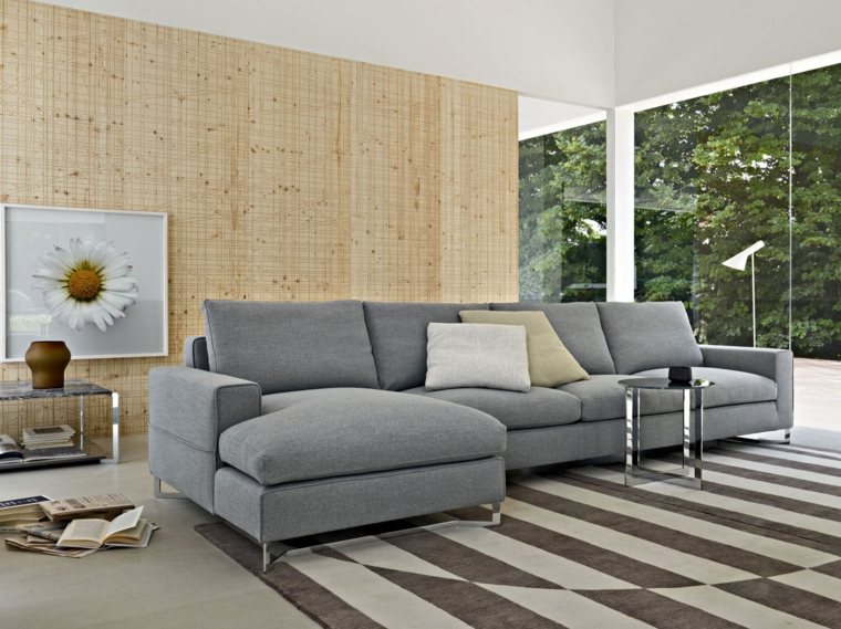 canapé d'angle design gris coussins moderne salon tapis de sol rayures