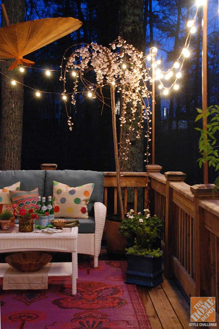 guirlande lumineuse idée balcon éclairage salon de jardin canapé résine tressée 