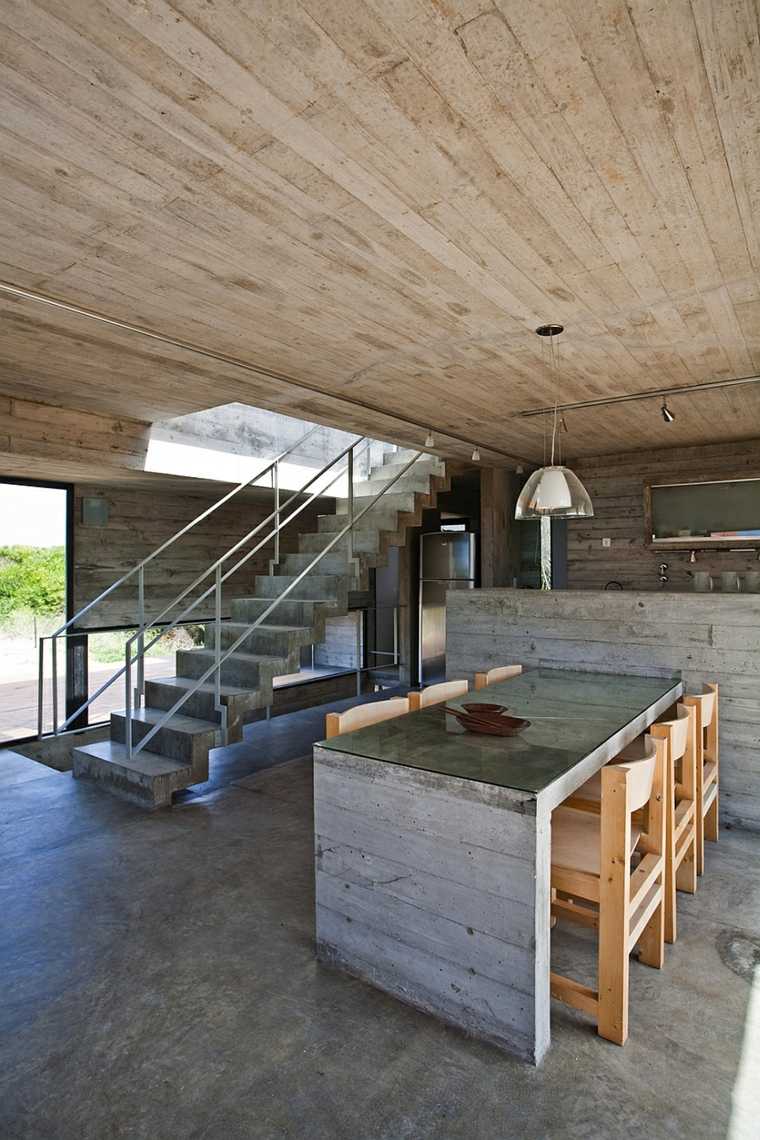 maison contemporaine intérieur moderne table en béton escalier chaise bois luminaire suspension design