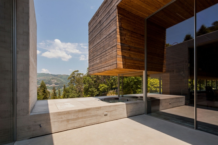 maison en bois design béton extérieur terrasse moderne studio design