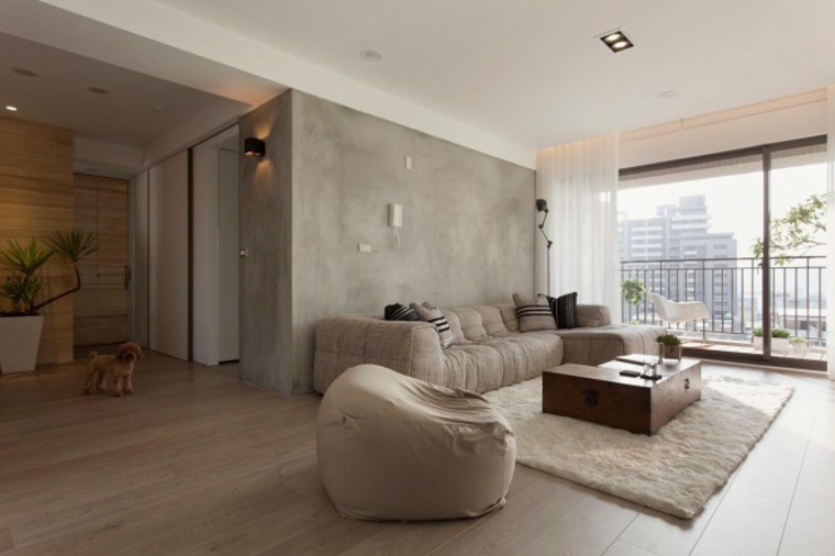 intérieurs modernes idée aménagement canapé beige design tapis de sol pouf beige table basse bois faux plafond