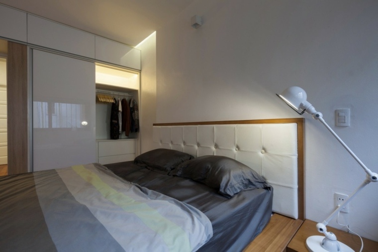 appartement jardin design chambre à coucher tête de lit matelassée