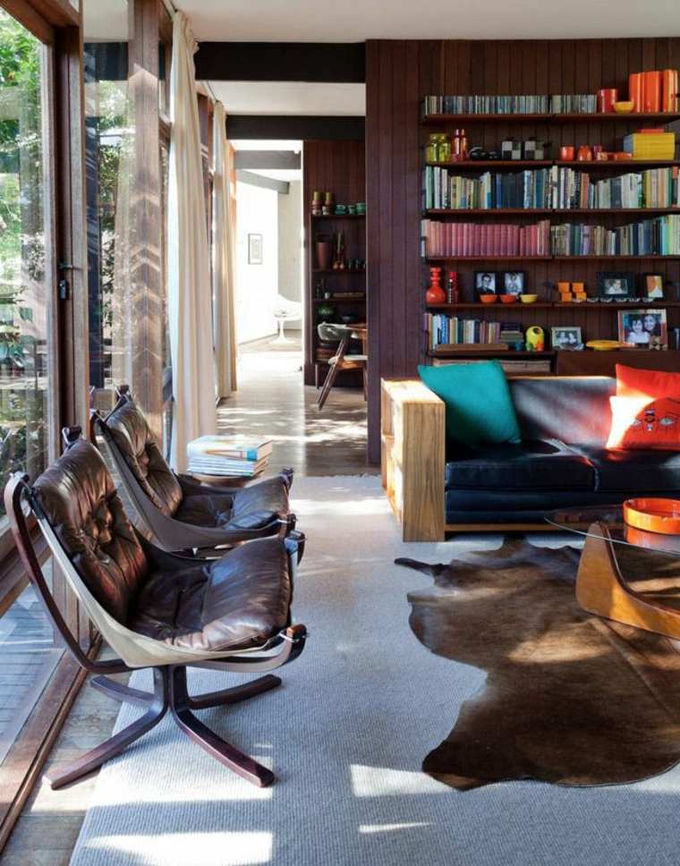 idée déco salon contemporain fauteuils cuir bibliotheque noire