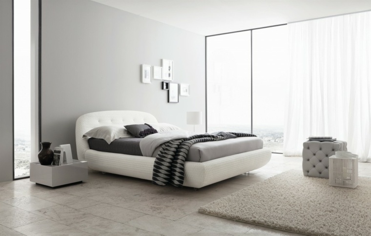 chambre à coucher blanche lit tête de lit design mur déco tapis sol beige