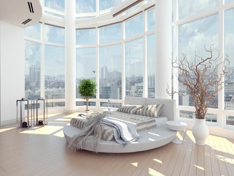 chambre à coucher blanche lit design coussins plante décorer espace idées