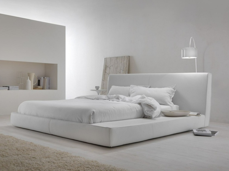 lit blanc tête de lit matelassé design tapis sol beige moderne