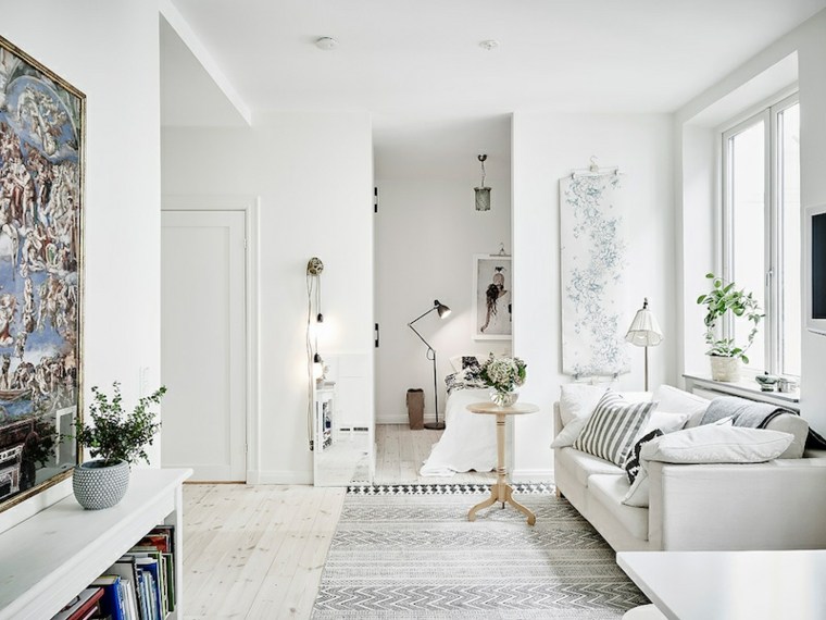 intérieur blanc moderne salon canapé coussin déco mur tapis 