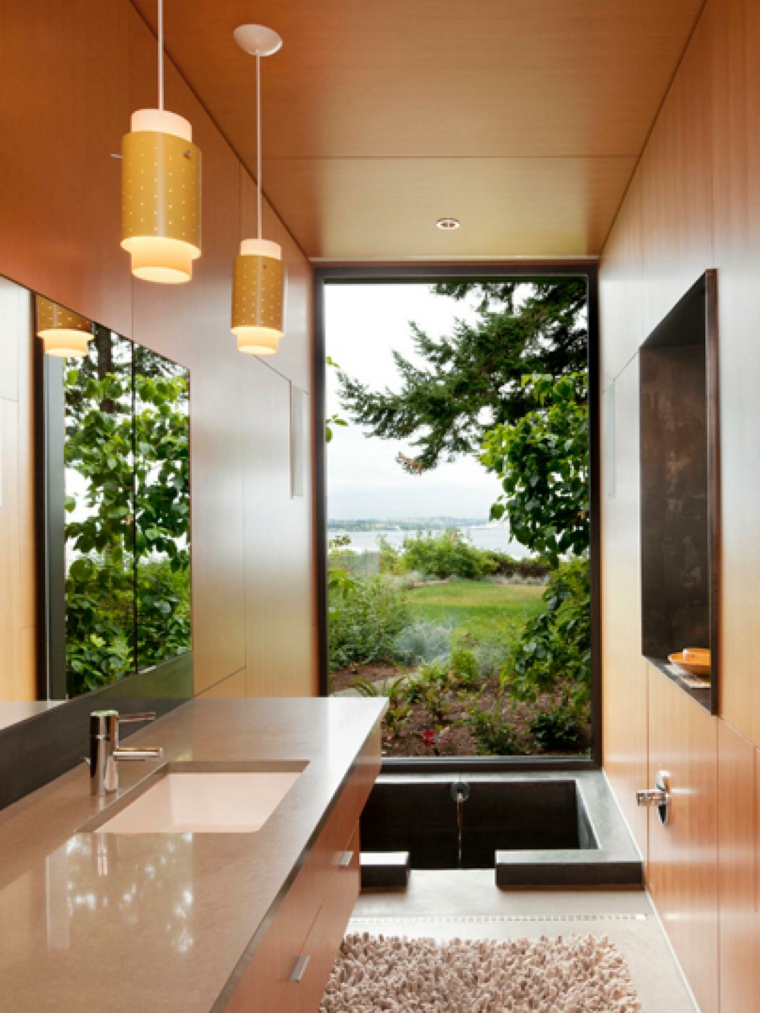 salle de bains design zen luminaire suspension pierre baignoire noire
