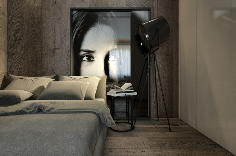 chambre à coucher design lit coussins décor noir blanc lampe projecteur
