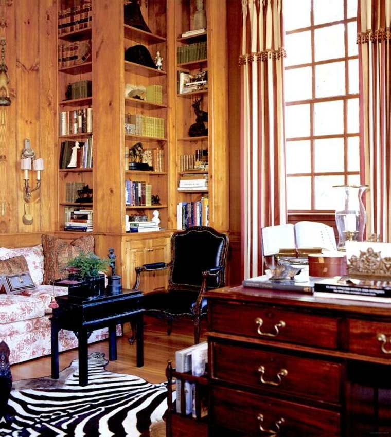 design d'intérieur contemporain tapis sol zèbre bureau bois fauteuil bibliothèque