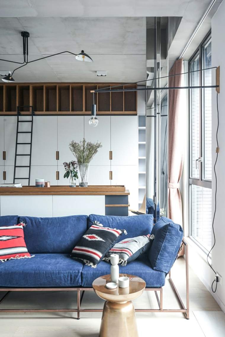aménagement petit appartement idée design canapé bleu cuisine ouverte