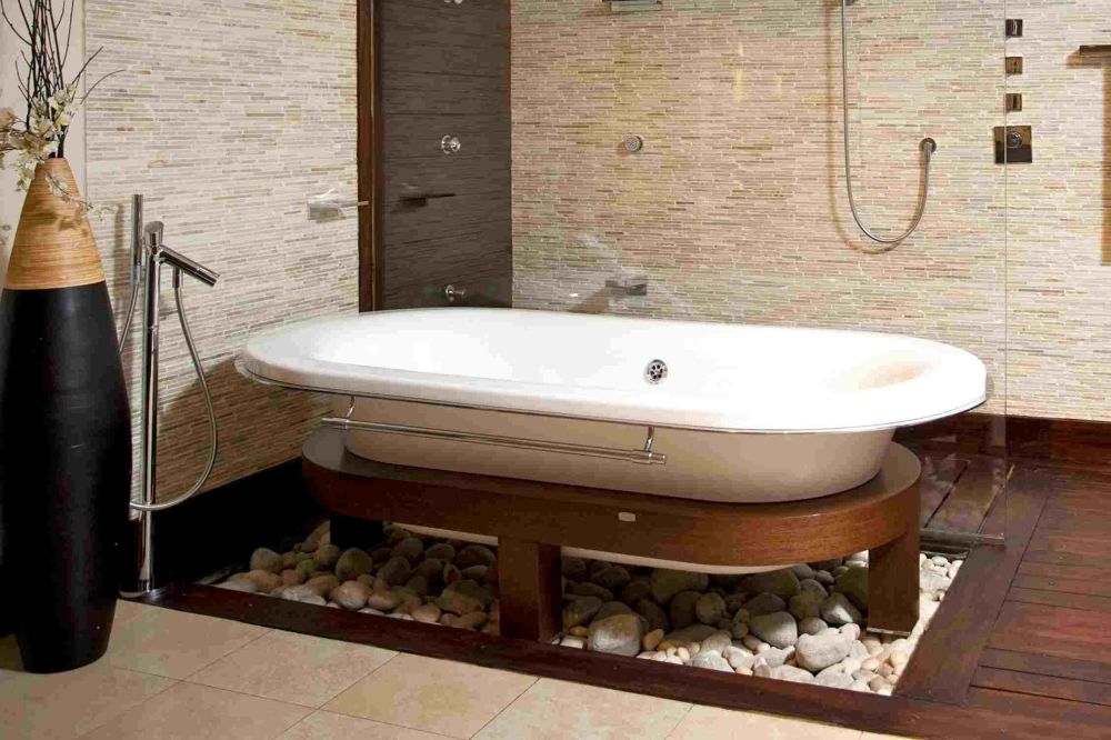 salle de bain simple et moderne baignoire pierres