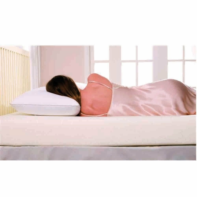 oreiller à mémoire de forme lit-femme-qui-dort