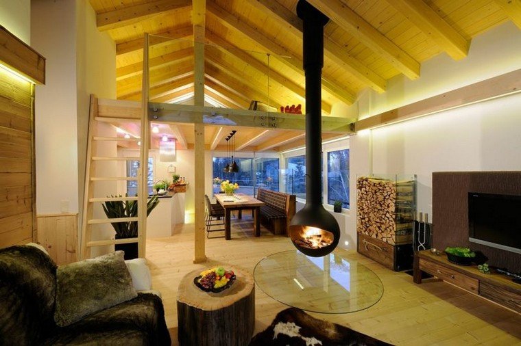 chalet montagne foyer intérieur moderne plafond bois canapé table basse