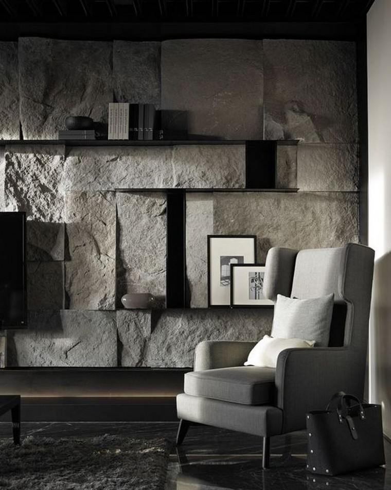déco minimaliste salon fauteuil gris mur pierre étagères déco pierre décorative