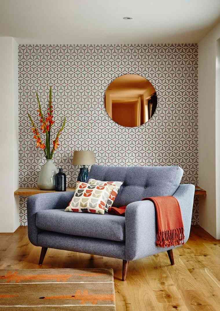 décoration de salon idée mur papier peint fauteuil coussins couverture