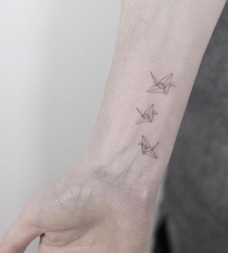 tatouage oiseau bras