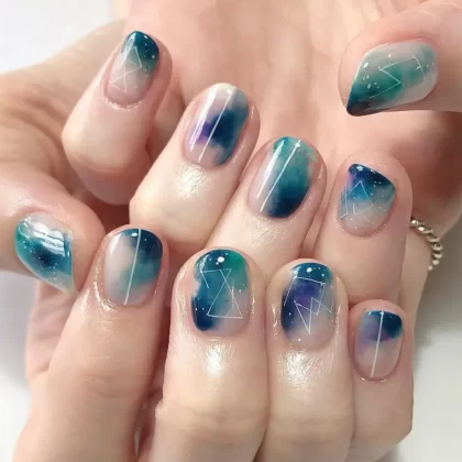 ongles galaxie en couleurs pastel 2022