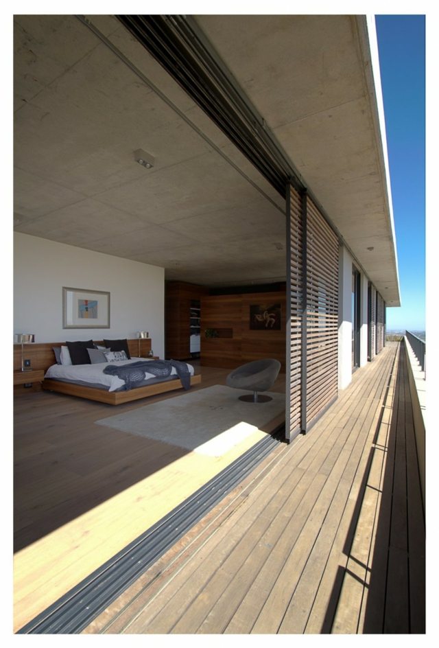 GASS Hillside Architecture Studios  des belles chambres à coucher accès direct la  longue terrasse