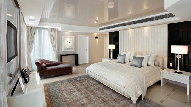 apaprtement luxe design chambre blanc or beige
