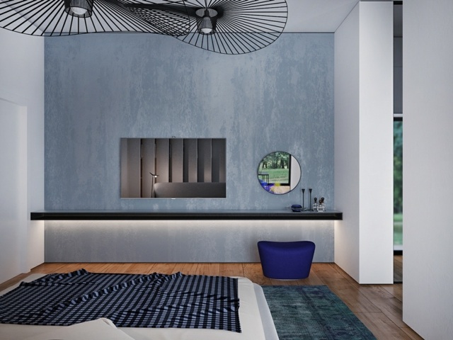 Appartement design avec une de ses chambres en bleu coucher conception