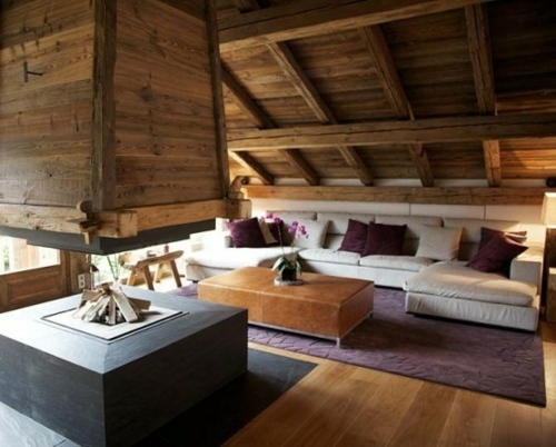chalet toit pente bois hotte foyer canape montagne