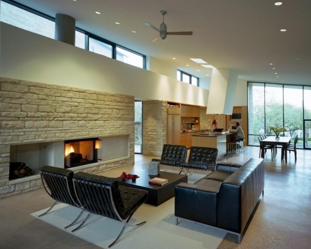 coin-salon-cuir-noir-mur-pierre-loft-moderne
