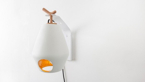 oeuvre design moderne accroché au mur crochet  lampe luminaire