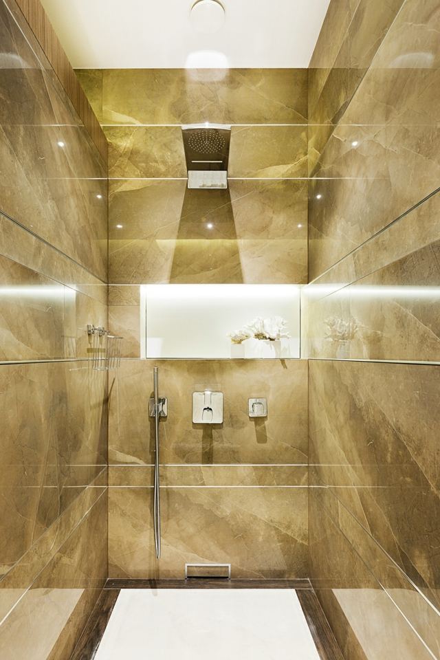 douche cabine dorée luxe