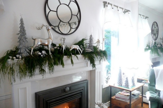 décoration-de-Noël-idée-originale-manteau-chiminée-branches-sapin-figurines-cerf